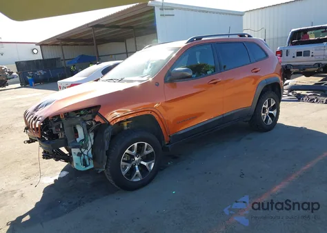 2015 Jeep Cherokee Trailhawk из США, поврежденный, VIN 1C4PJMBSXFW778247